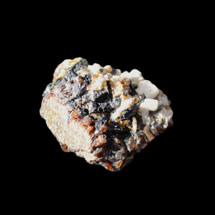 Red Zircon, Spessartine, Tourmaline on Epidote & Feldspar specimen 28*25*28mm 21g in sunlight - Rocks and Things Store