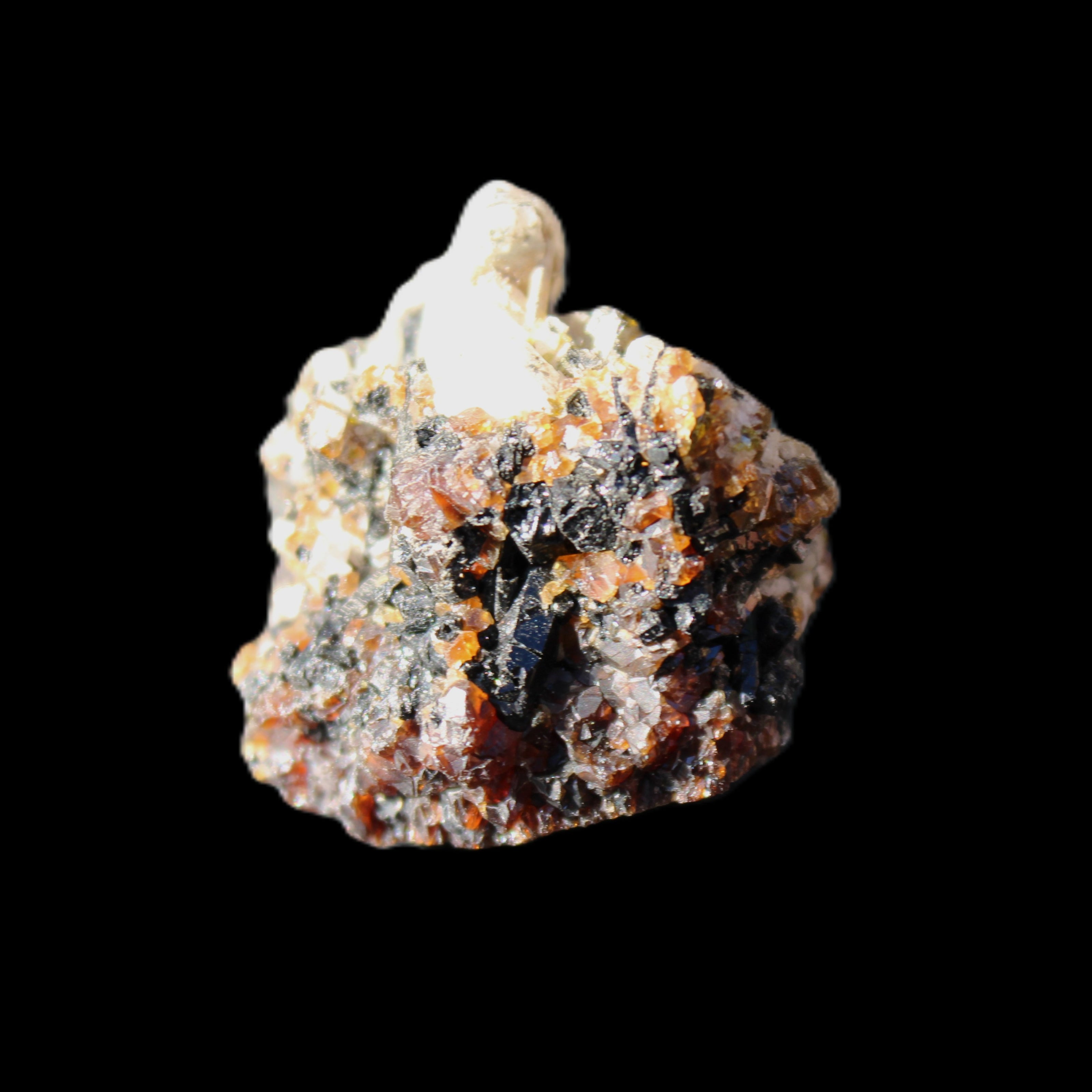 Red Zircon, Spessartine, Tourmaline on Epidote & Feldspar specimen 28*25*28mm 21g in sunlight - Rocks and Things Store