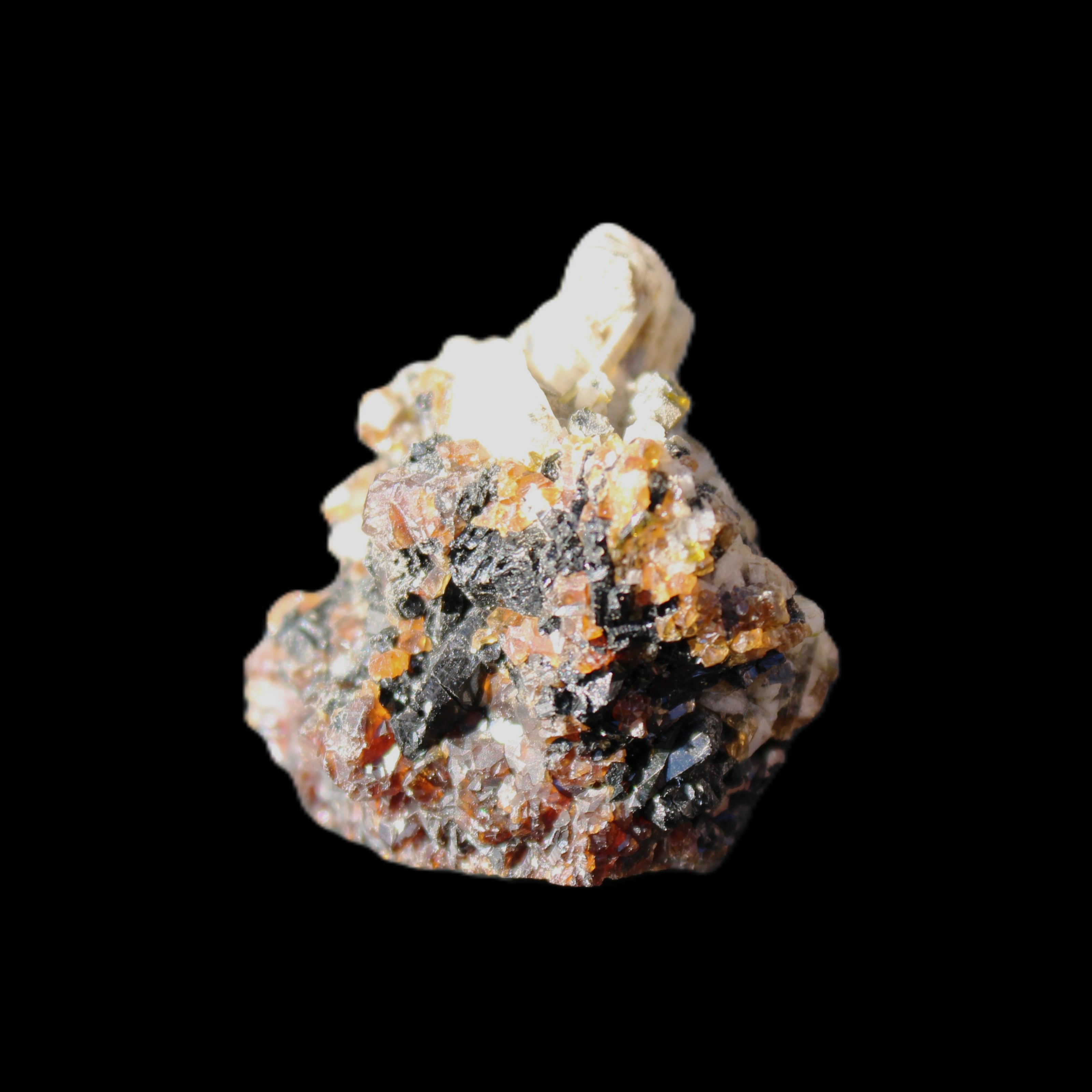 Red Zircon, Spessartine, Tourmaline on Epidote & Feldspar specimen 28*25*28mm 21g in sunlight - Rocks and Things Store