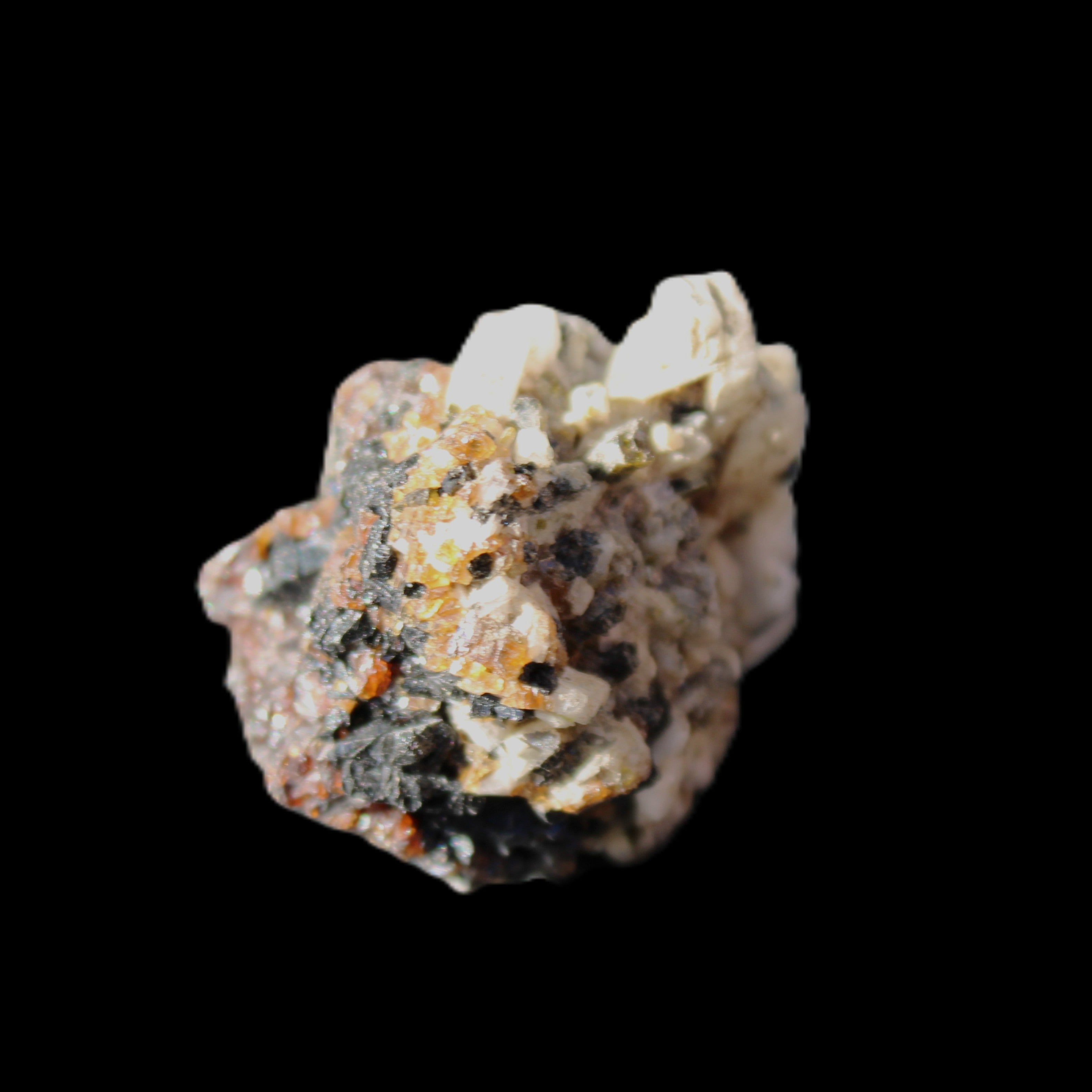 Red Zircon, Spessartine, Tourmaline on Epidote & Feldspar specimen 28*25*28mm 21g in sunlight - Rocks and Things Store