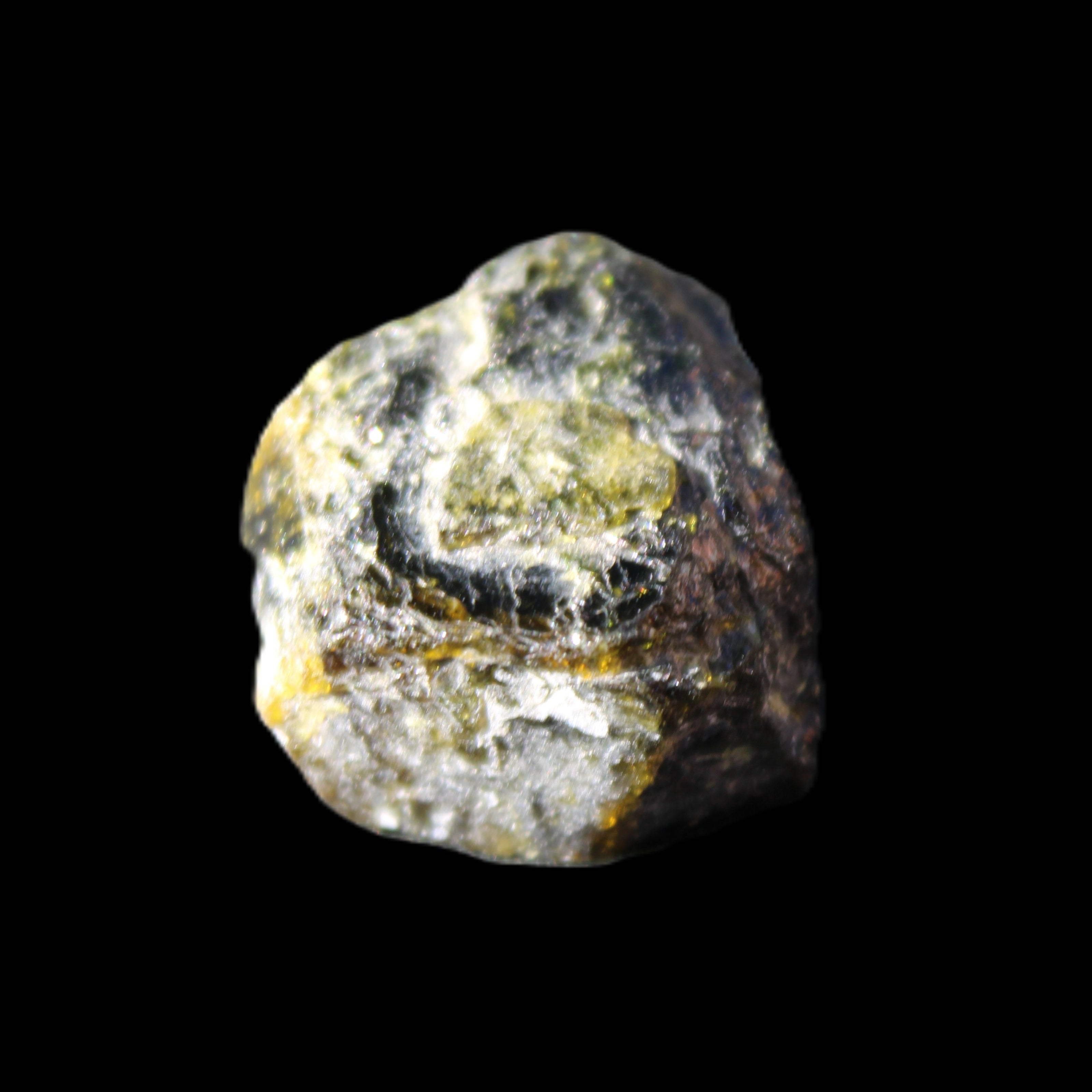 Magnetic Epidote glossy irregular hexagon crystal 20mm 9-11g in sunlight - Rocks and Things Store