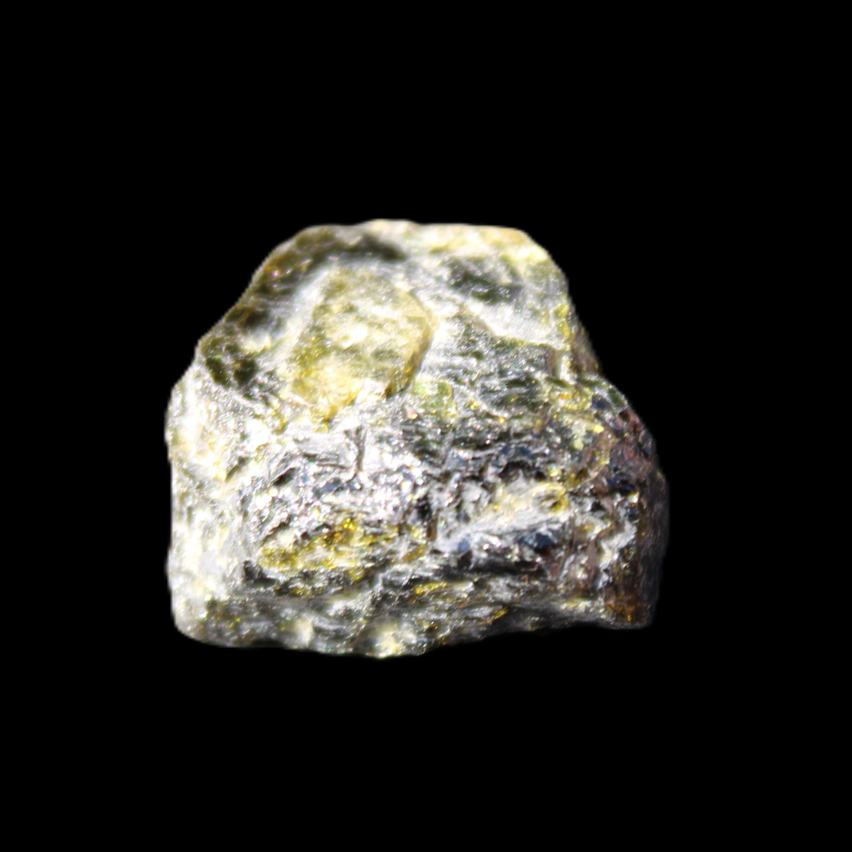 Magnetic Epidote glossy irregular hexagon crystal 20mm 9-11g in sunlight - Rocks and Things Store