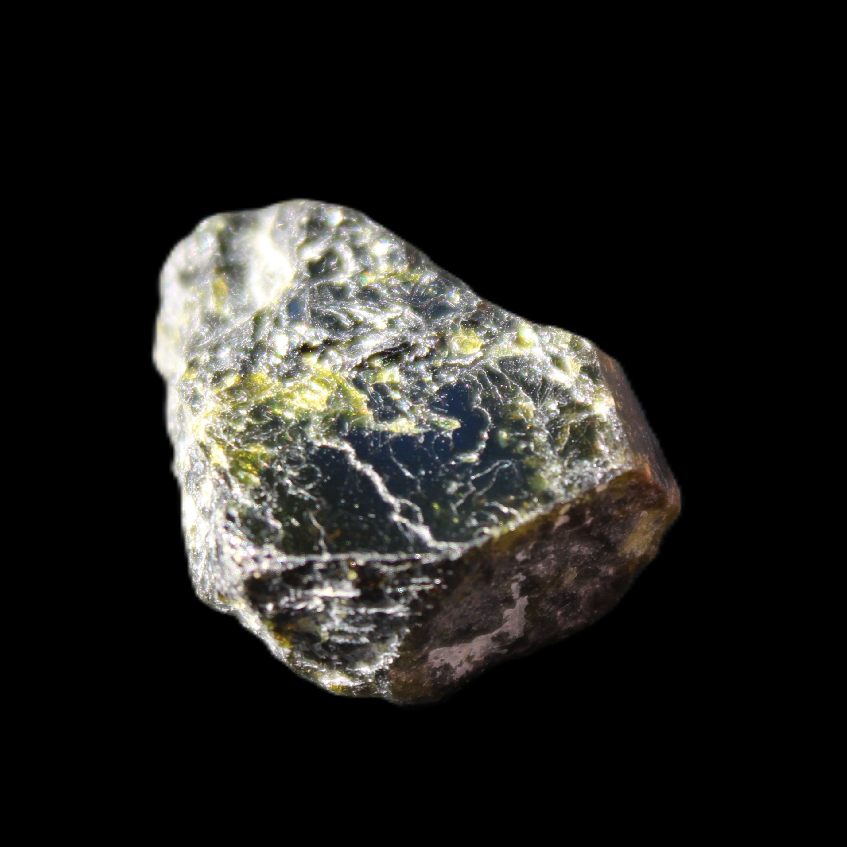 Magnetic Epidote glossy irregular hexagon crystal 20mm 9-11g in sunlight - Rocks and Things Store