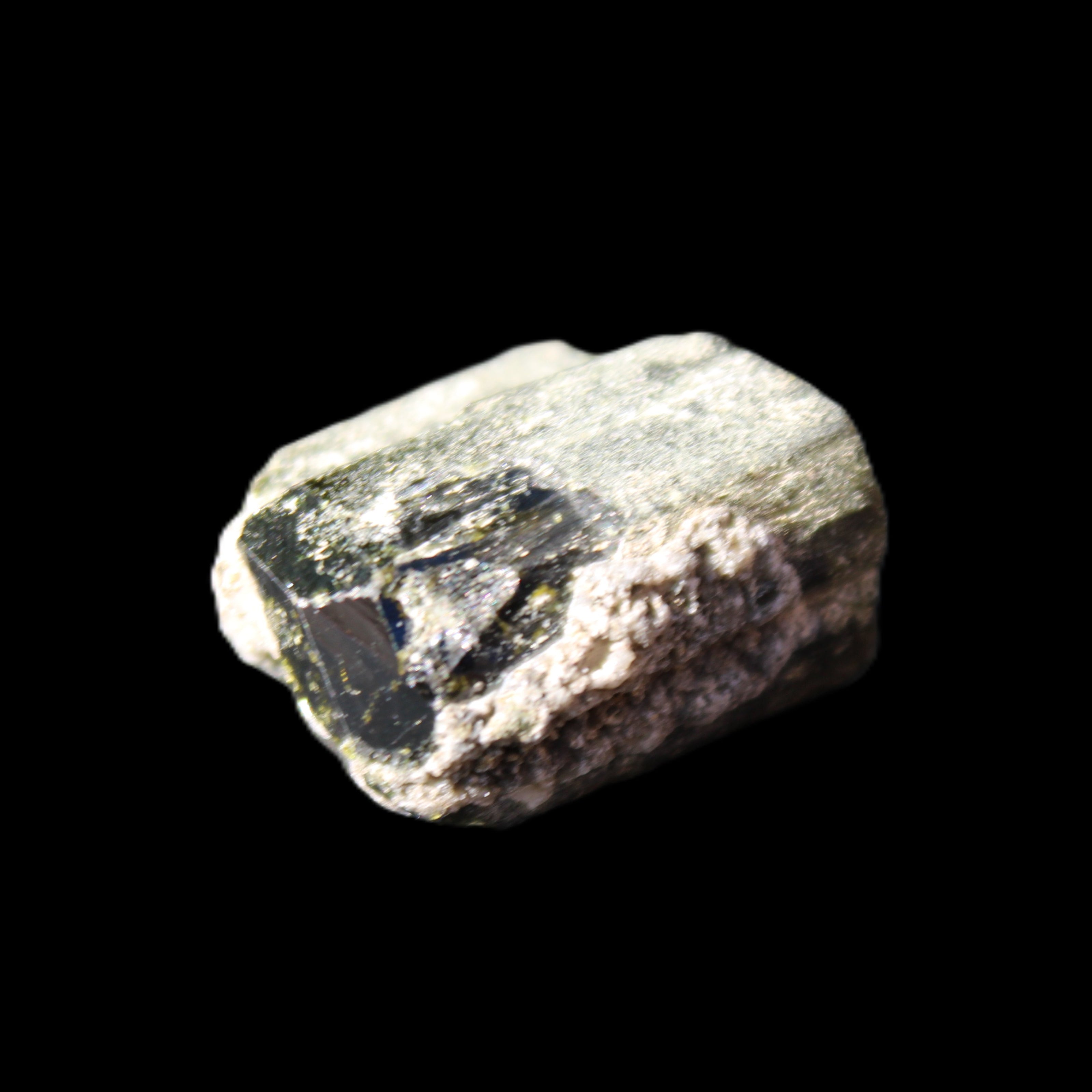 Magnetic Epidote glossy irregular hexagon crystal 20mm 9-11g in sunlight - Rocks and Things Store