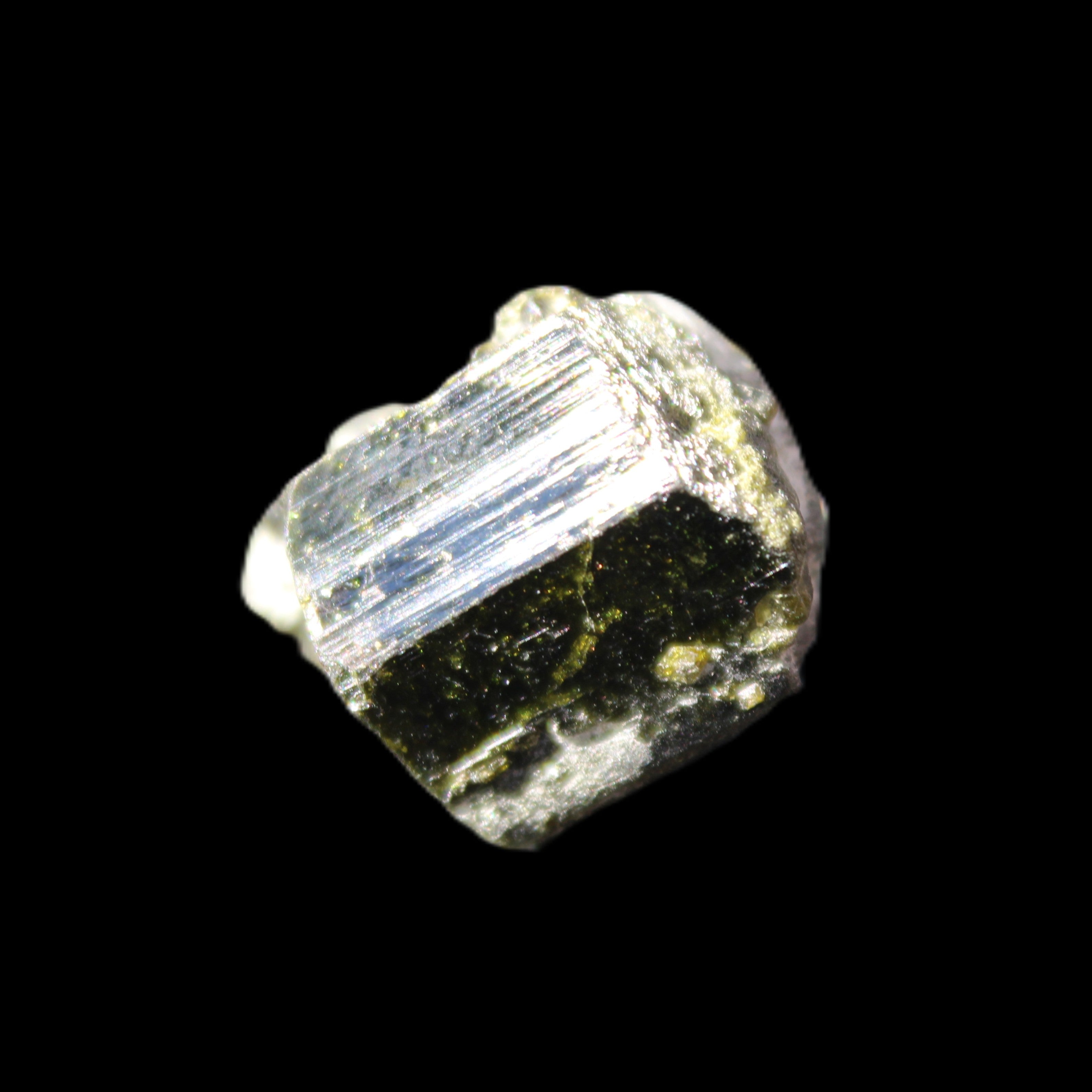 Magnetic Epidote glossy irregular hexagon crystal 20mm 9-11g in sunlight - Rocks and Things Store