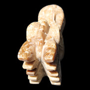 Chocolate Calcite Dragon's head hand-carved 118*41*85mm 494g in sunlight - Rocks and Things Store