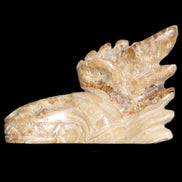 Chocolate Calcite Dragon's head hand-carved 118*41*85mm 494g in sunlight - Rocks and Things Store