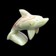 Afghan Jade Leaping Dolphin hand-carved 81*88*31mm 176g in sunlight - Rocks and Things Store