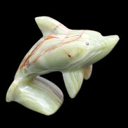 Afghan Jade Leaping Dolphin hand-carved 81*88*31mm 176g in sunlight - Rocks and Things Store