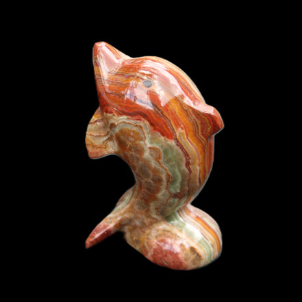 Colouful Afghan Jade Leaping Dolphin hand-carved 83*53*33mm 184g in sunlight - Rocks and Things Store