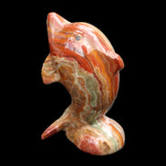Colouful Afghan Jade Leaping Dolphin hand-carved 83*53*33mm 184g in sunlight - Rocks and Things Store