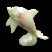 Afghan Jade Leaping Dolphin hand-carved 95*69*34mm 190g in sunlight - Rocks and Things Store