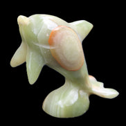 Afghan Jade Leaping Dolphin hand-carved 95*69*34mm 190g in sunlight - Rocks and Things Store