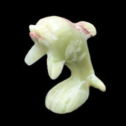 Afghan Jade Leaping Dolphin hand-carved 78*59*30mm 125g in sunlight - Rocks and Things Store
