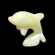 Afghan Jade Leaping Dolphin hand-carved 79*65*27mm 145g in sunlight - Rocks and Things Store