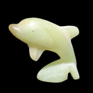 Afghan Jade Leaping Dolphin hand-carved 79*65*27mm 145g in sunlight - Rocks and Things Store