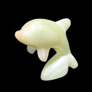 Afghan Jade Leaping Dolphin hand-carved 79*65*27mm 145g in sunlight - Rocks and Things Store