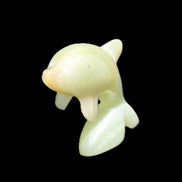Afghan Jade Leaping Dolphin hand-carved 79*65*27mm 145g in sunlight - Rocks and Things Store