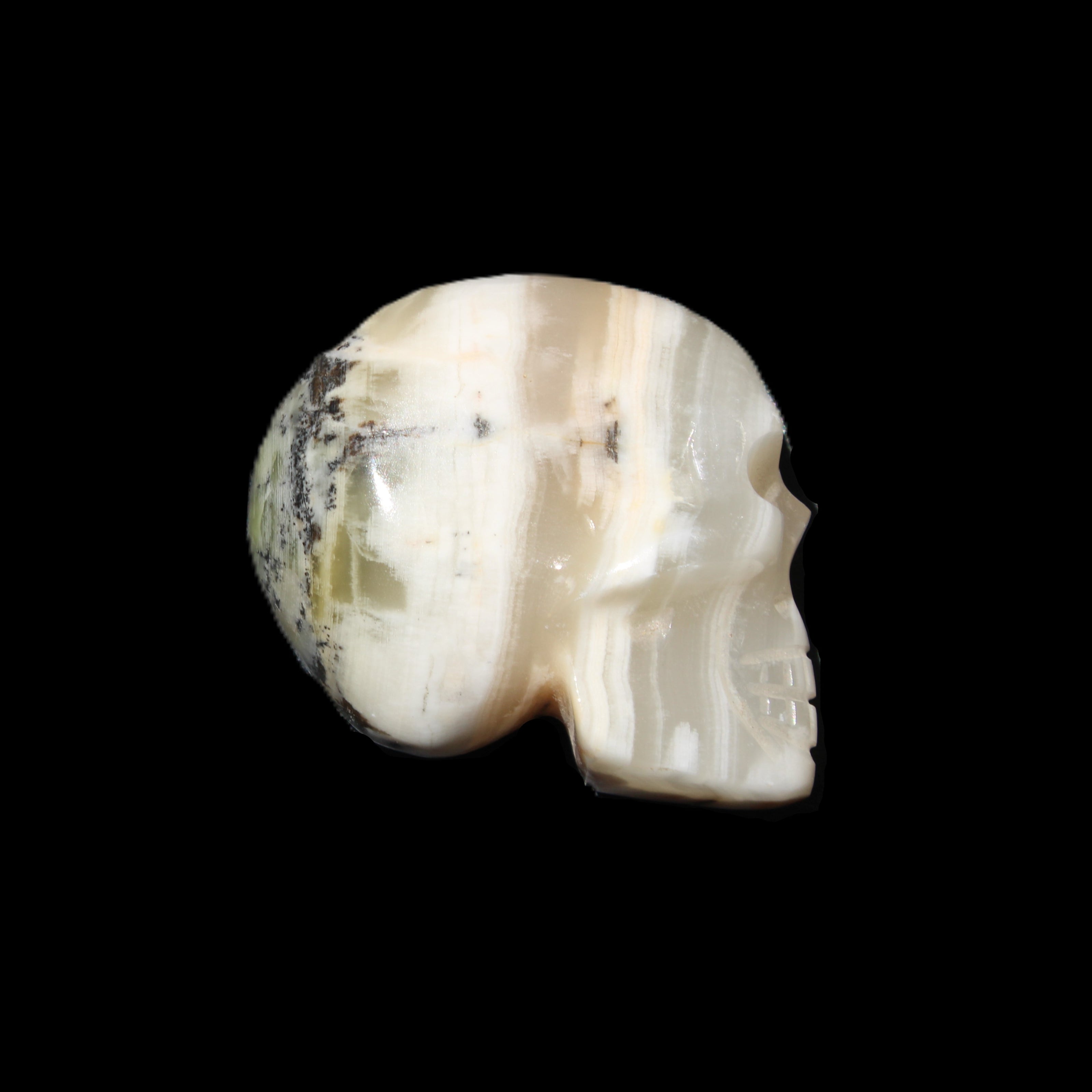 Afghan Jade skull hand-carved 55*48*33mm 168g in sunlight - Rocks and Things Store