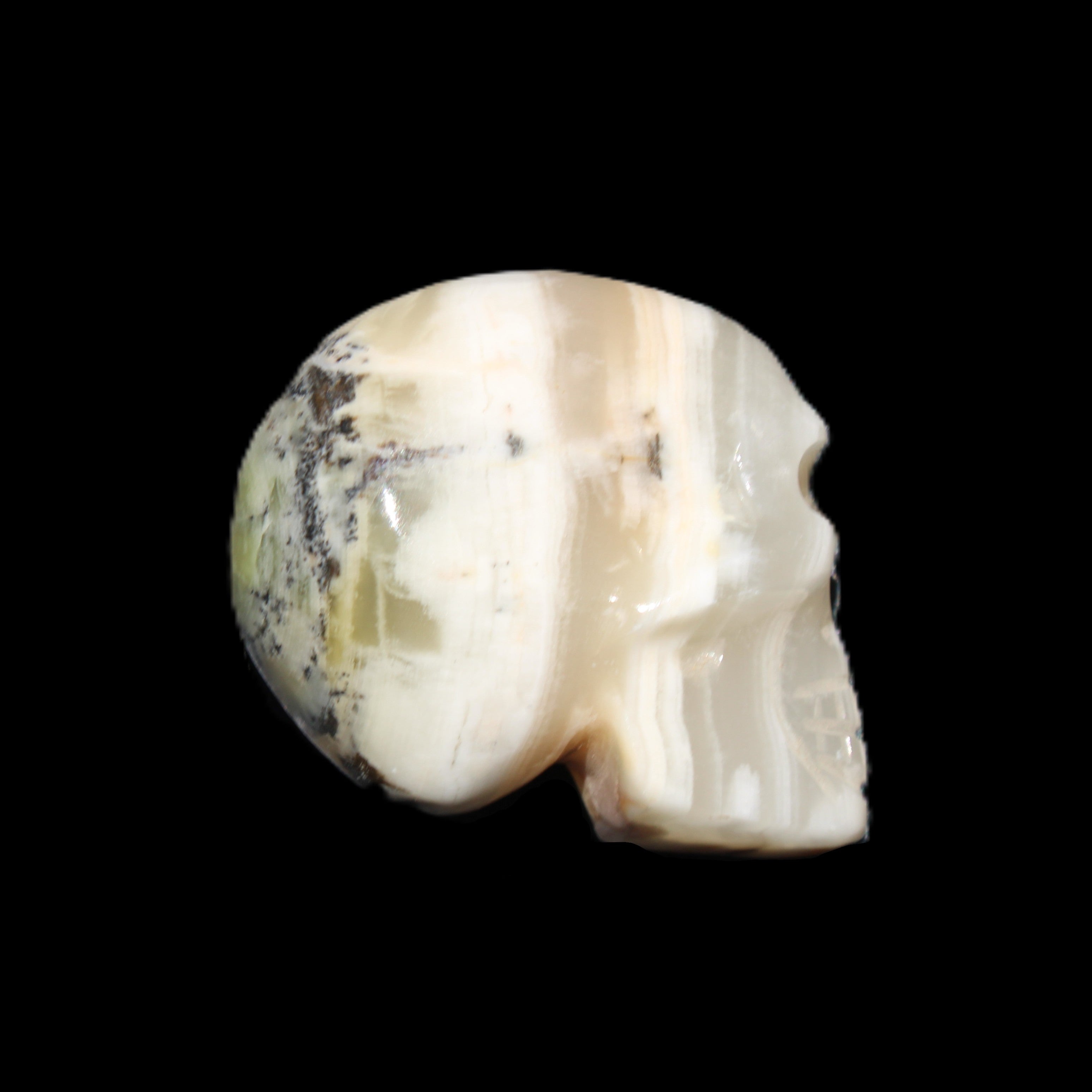 Afghan Jade skull hand-carved 55*48*33mm 168g in sunlight - Rocks and Things Store