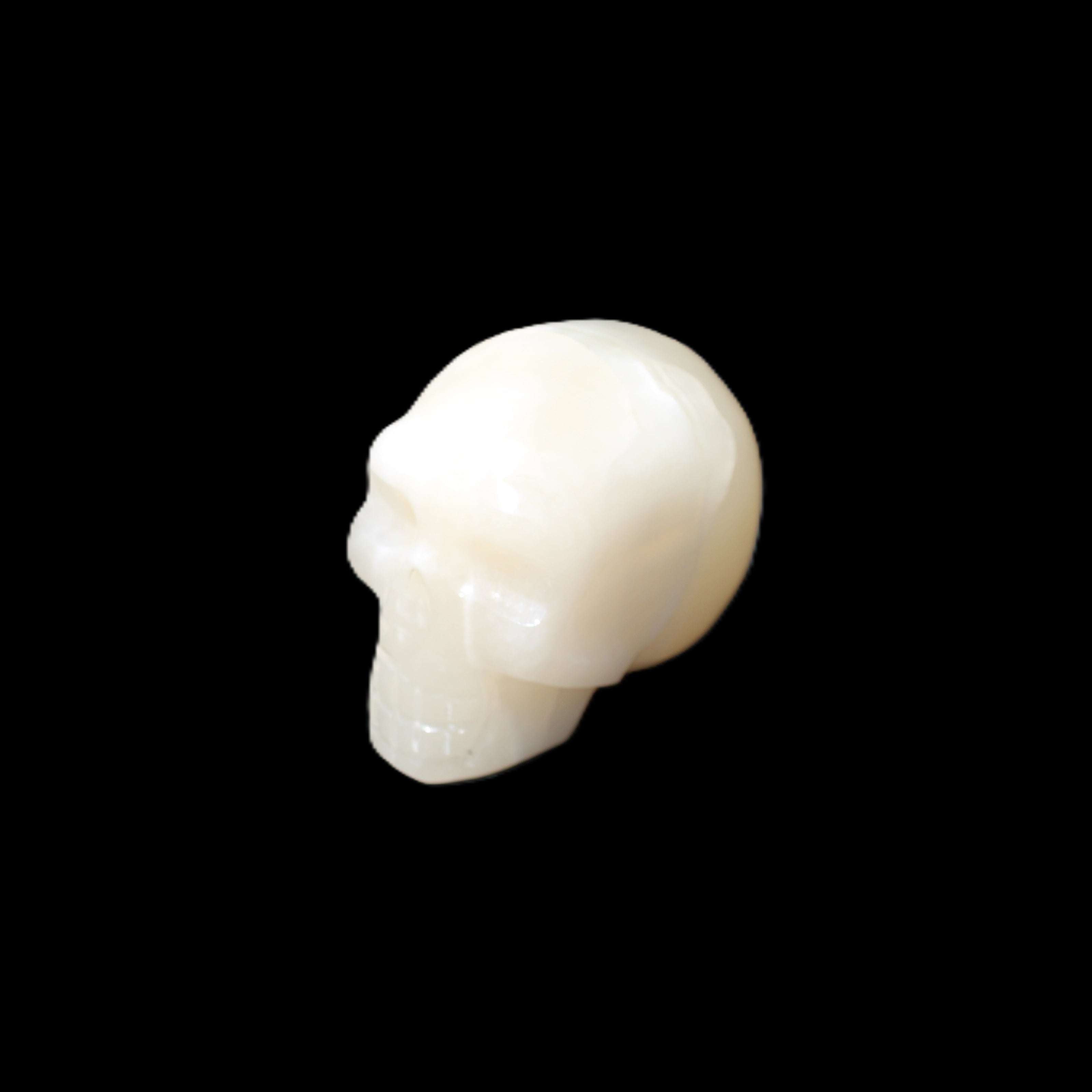 Afghan Jade skull hand-carved 55*48*33mm 172g in sunlight - Rocks and Things Store