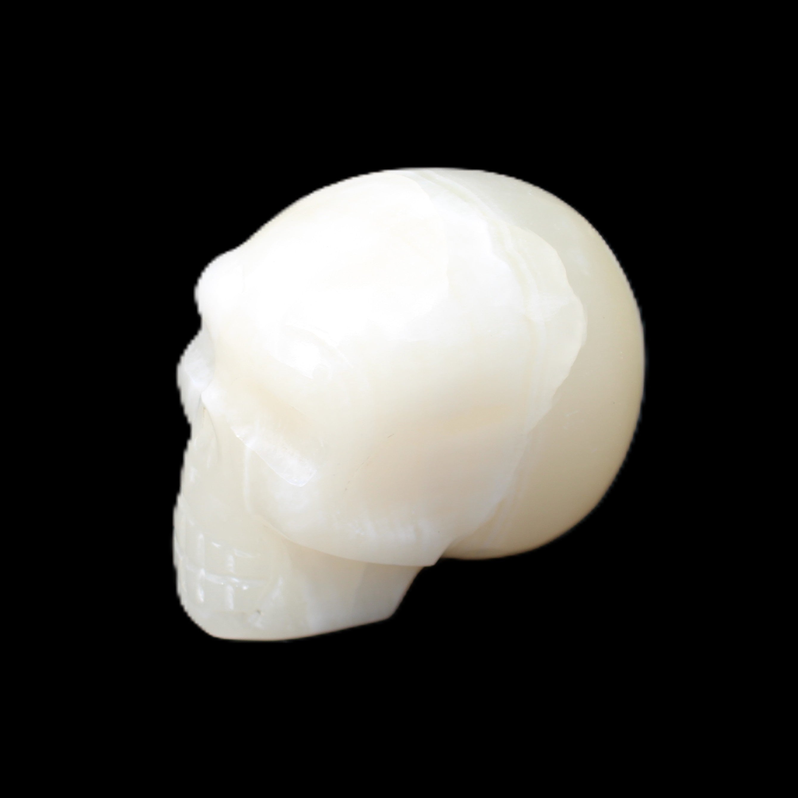 Afghan Jade skull hand-carved 55*48*33mm 172g in sunlight - Rocks and Things Store