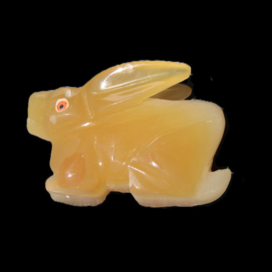 Honey Calcite bunny hand-carved 102*67*52mm 477g in sunlight - Rocks and Things Store