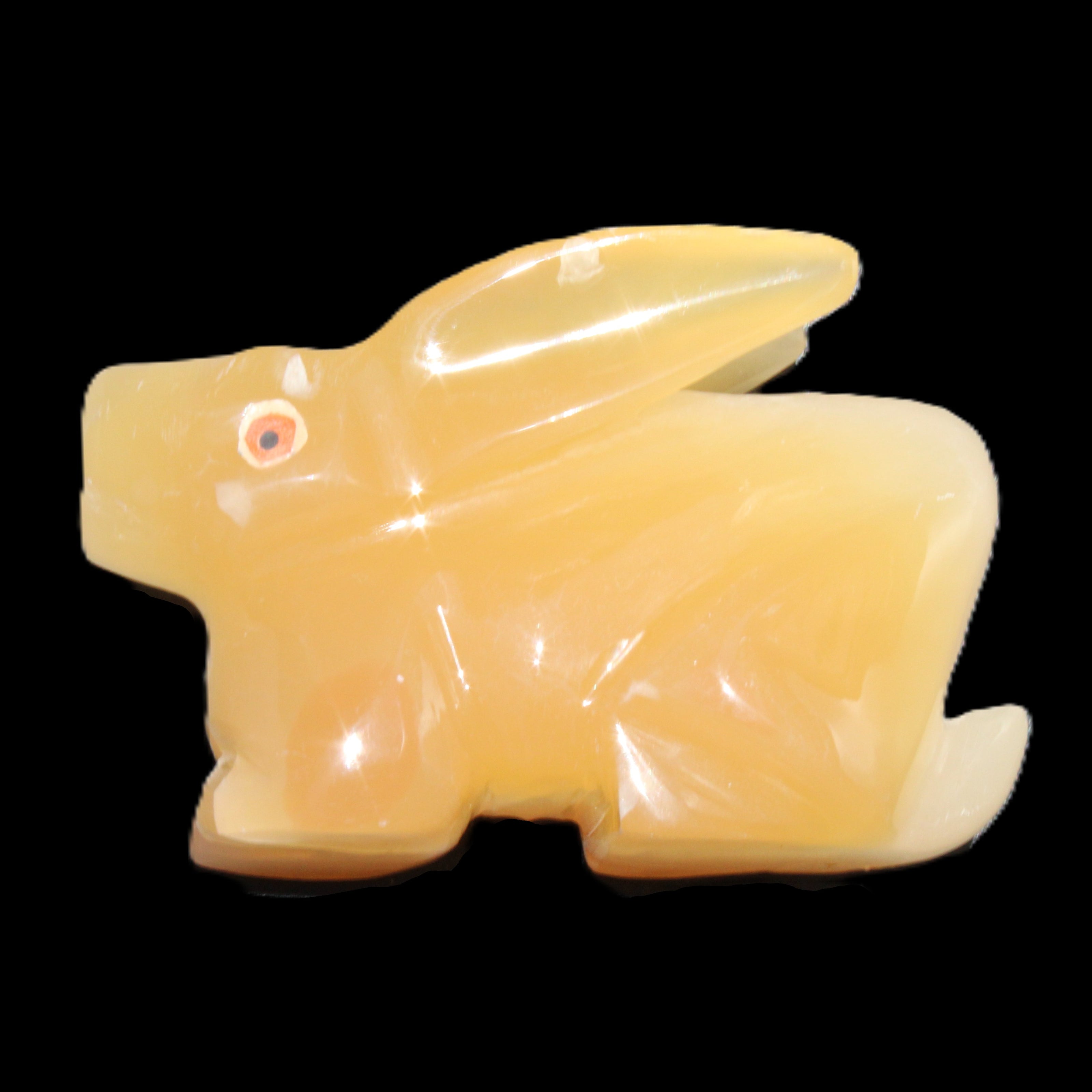 Honey Calcite bunny hand-carved 102*67*52mm 477g in sunlight - Rocks and Things Store