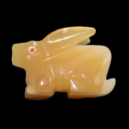 Honey Calcite bunny hand-carved 102*67*52mm 477g in sunlight - Rocks and Things Store