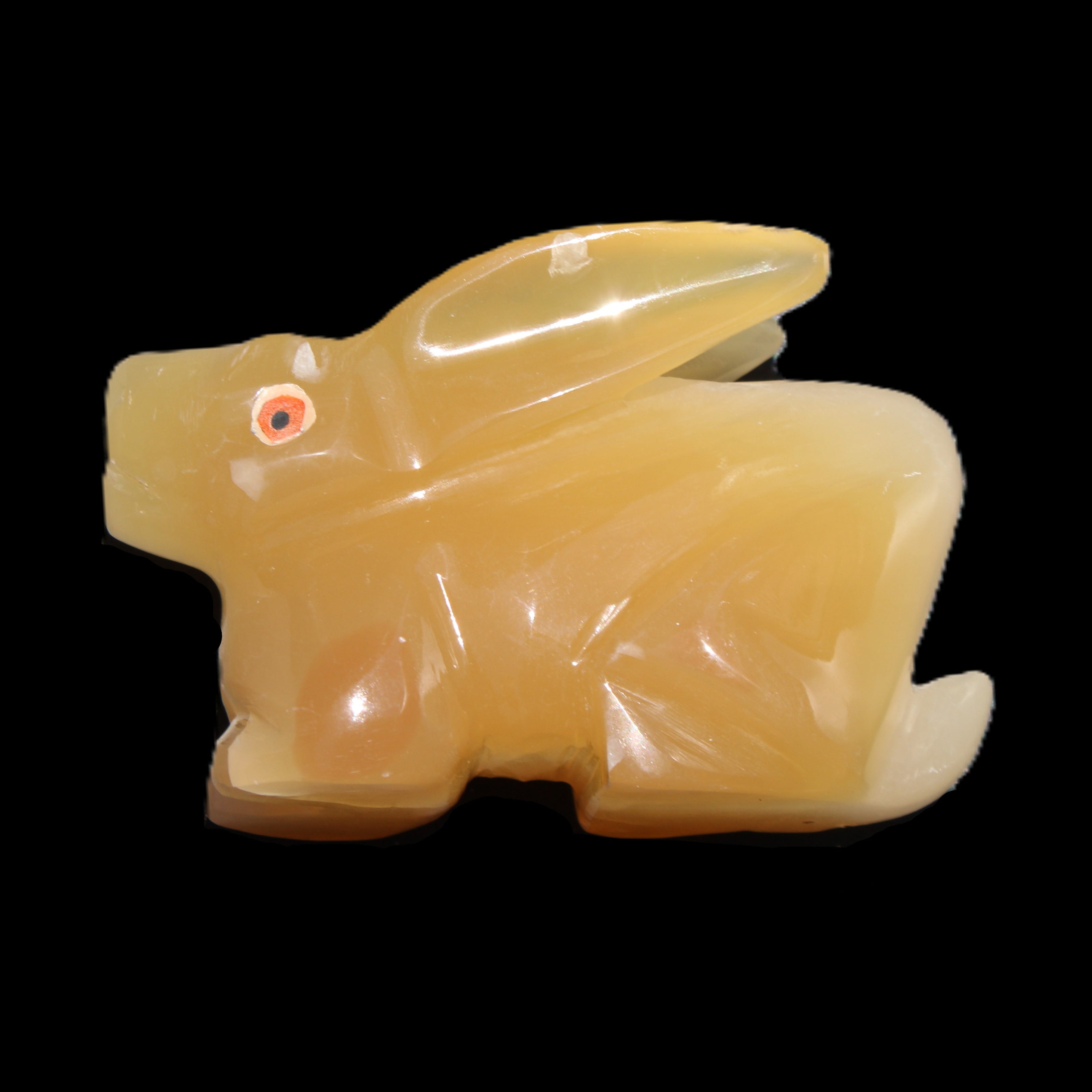 Honey Calcite bunny hand-carved 102*67*52mm 477g in sunlight - Rocks and Things Store