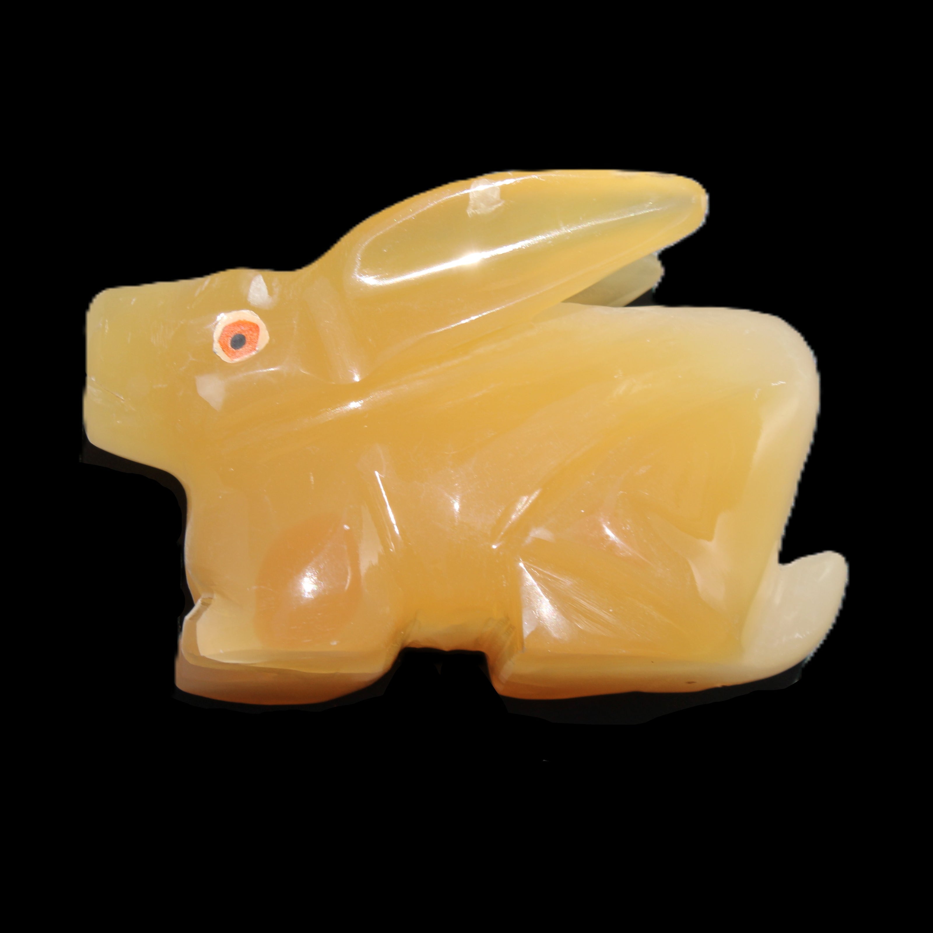 Honey Calcite bunny hand-carved 102*67*52mm 477g in sunlight - Rocks and Things Store