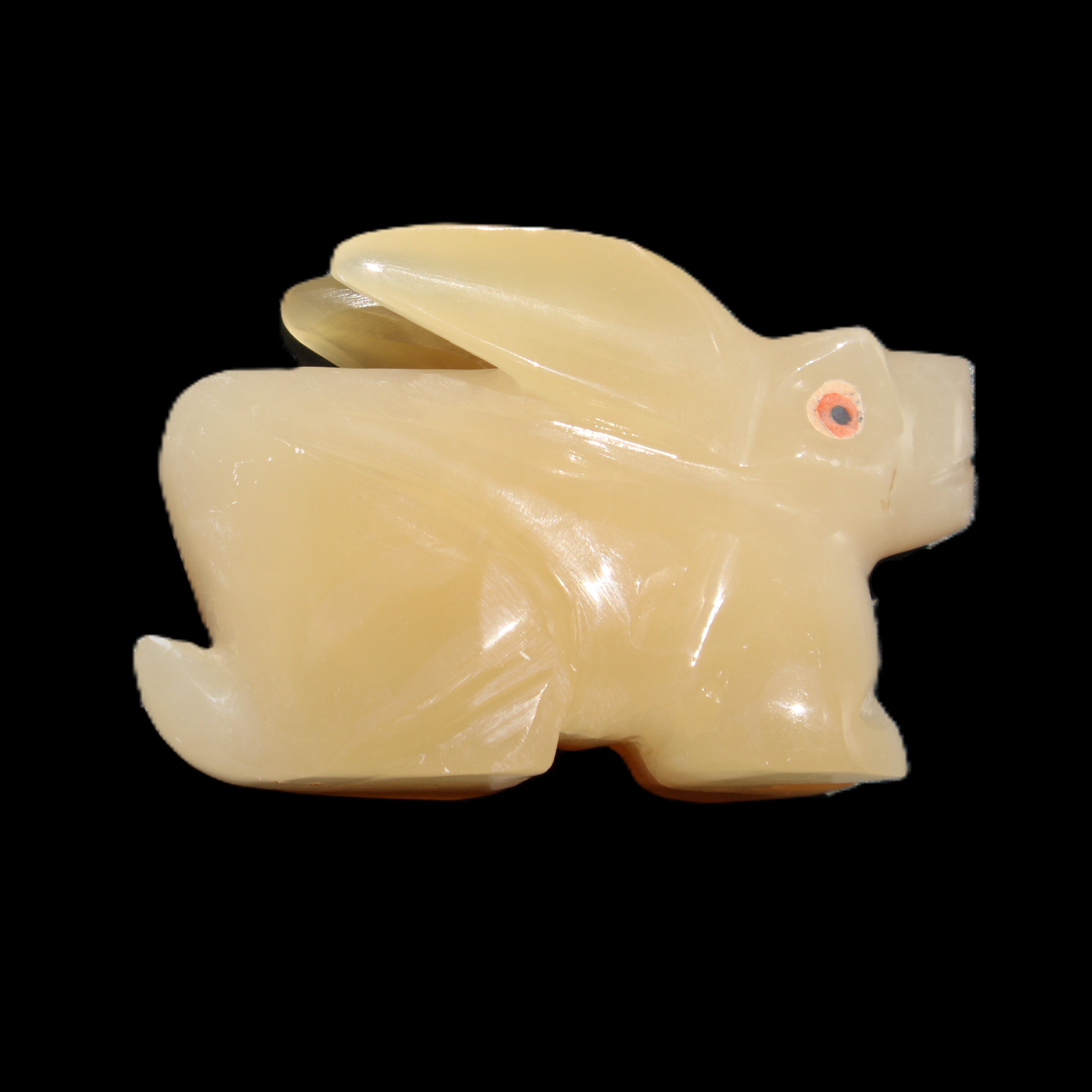 Honey Calcite bunny hand-carved 102*67*52mm 477g in sunlight - Rocks and Things Store