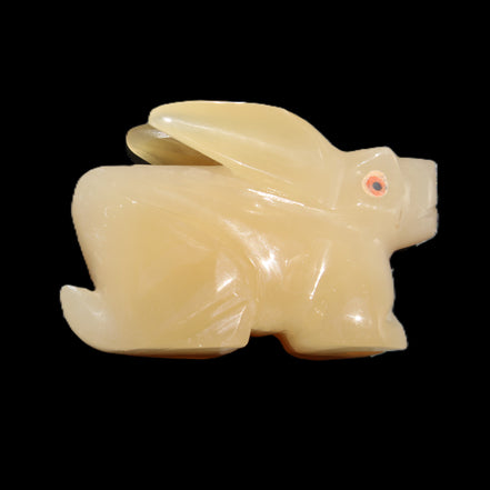 Honey Calcite bunny hand-carved 102*67*52mm 477g in sunlight - Rocks and Things Store
