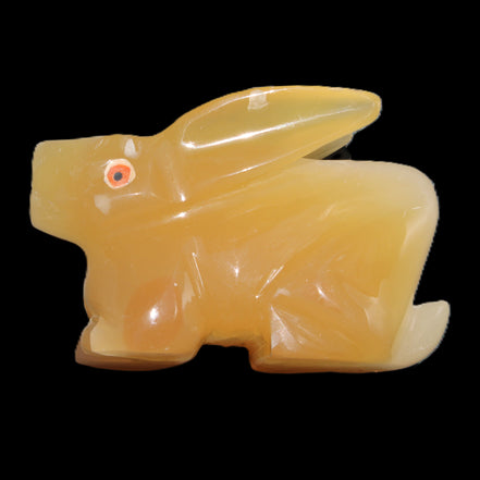 Honey Calcite bunny hand-carved 102*67*52mm 477g in sunlight - Rocks and Things Store