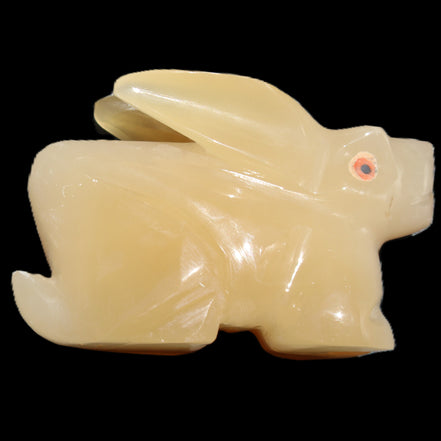 Honey Calcite bunny hand-carved 102*67*52mm 477g in sunlight - Rocks and Things Store