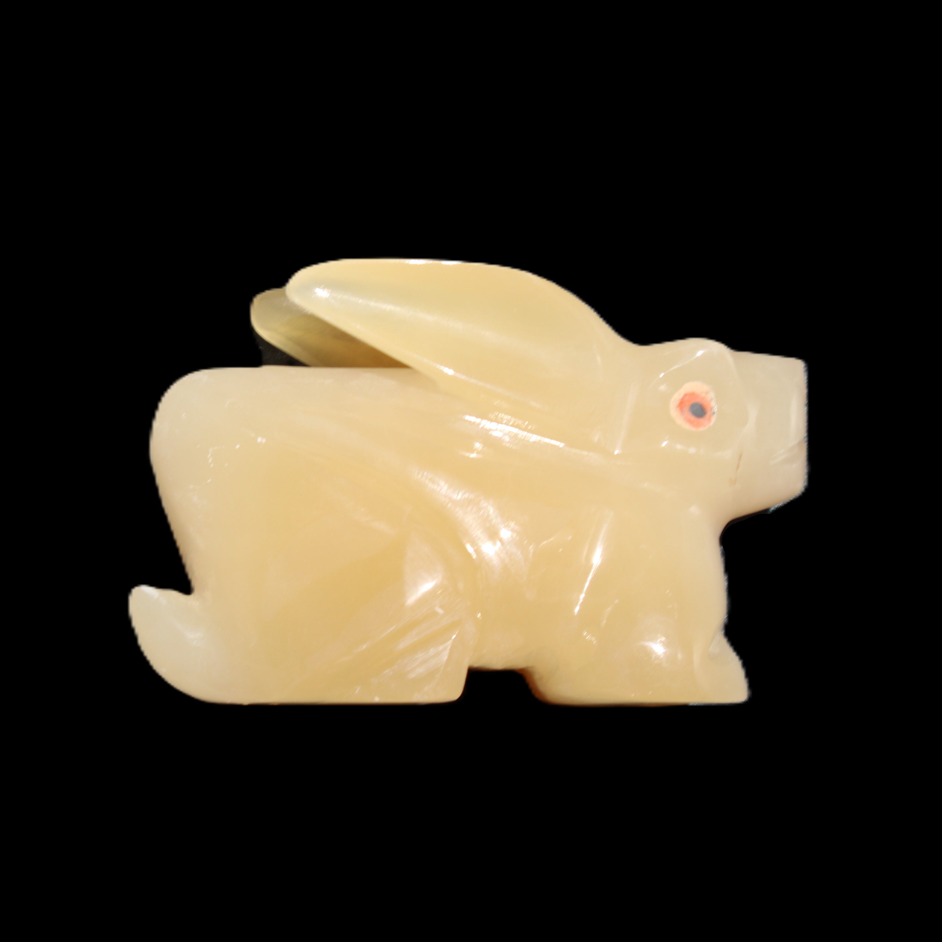 Honey Calcite bunny hand-carved 102*67*52mm 477g in sunlight - Rocks and Things Store