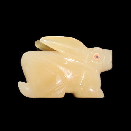 Honey Calcite bunny hand-carved 102*67*52mm 477g in sunlight - Rocks and Things Store