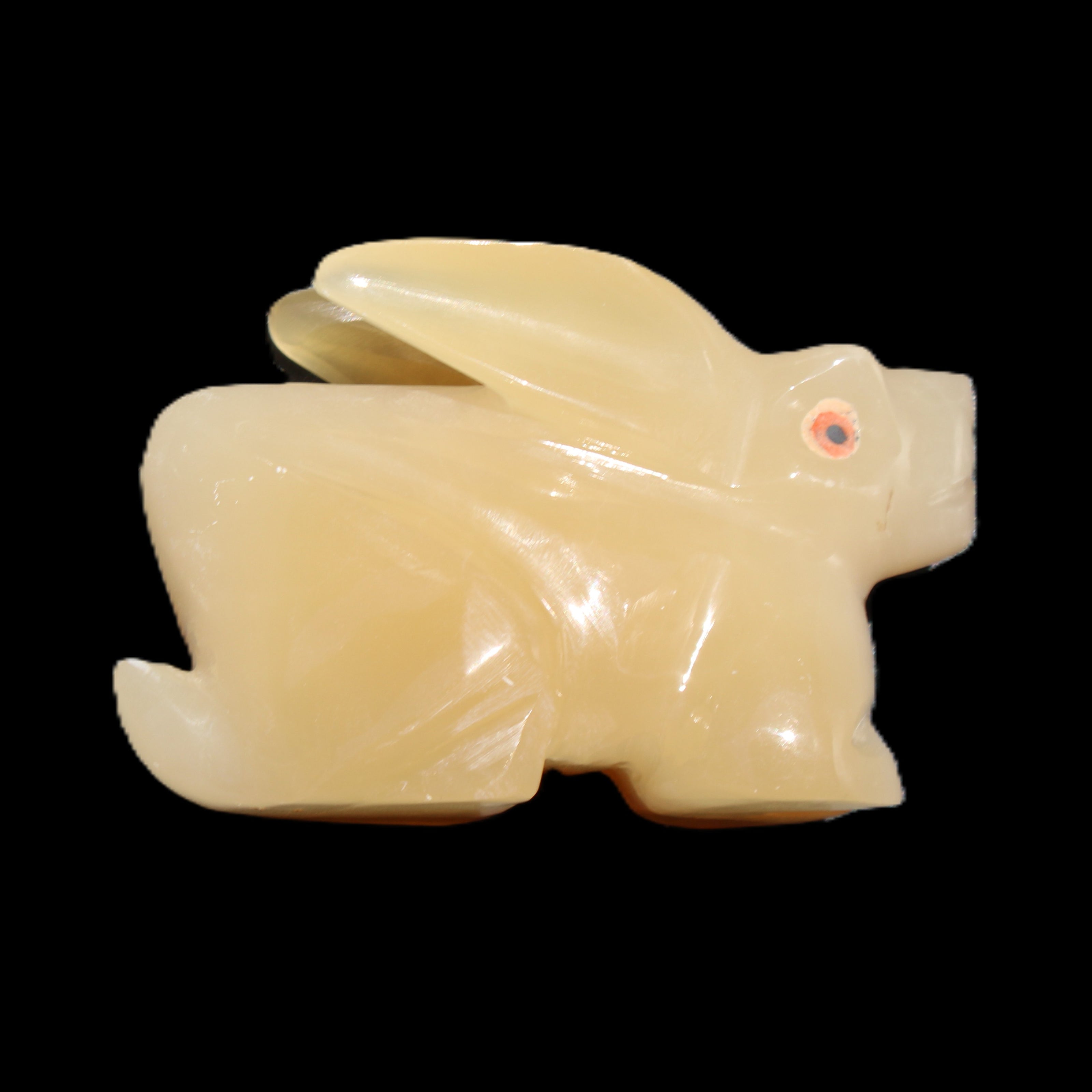Honey Calcite bunny hand-carved 102*67*52mm 477g in sunlight - Rocks and Things Store