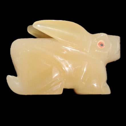 Honey Calcite bunny hand-carved 102*67*52mm 477g in sunlight - Rocks and Things Store