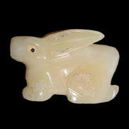 Honey Calcite bunny hand-carved 100*67*52mm 459g in sunlight - Rocks and Things Store