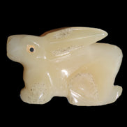 Honey Calcite bunny hand-carved 100*67*52mm 459g in sunlight - Rocks and Things Store