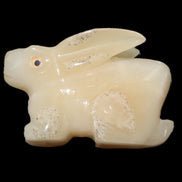 Honey Calcite bunny hand-carved 100*67*52mm 459g in sunlight - Rocks and Things Store