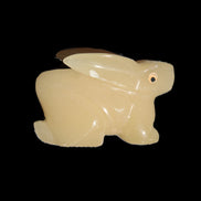 Honey Calcite bunny hand-carved 100*67*52mm 459g in sunlight - Rocks and Things Store