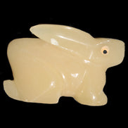 Honey Calcite bunny hand-carved 100*67*52mm 459g in sunlight - Rocks and Things Store