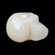 Honey Calcite skull hand-carved 58*48*40mm 175g in sunlight - Rocks and Things Store