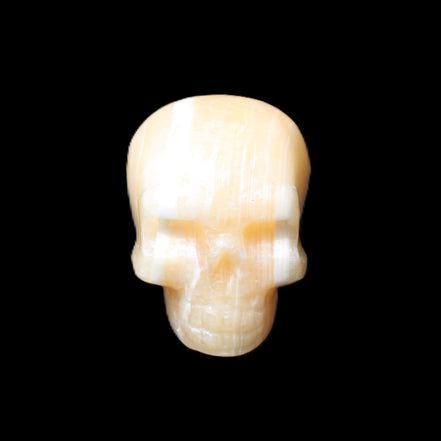 Yellow Calcite skull hand-carved 49*43*34mm 131g in sunlight - Rocks and Things Store