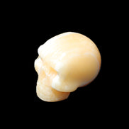 Yellow Calcite skull hand-carved 49*43*34mm 131g in sunlight - Rocks and Things Store
