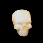 Yellow Calcite skull hand-carved 49*43*34mm 131g in sunlight - Rocks and Things Store