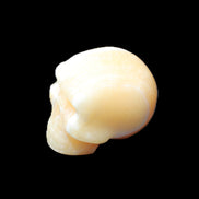 Yellow Calcite skull hand-carved 49*43*34mm 131g in sunlight - Rocks and Things Store