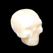 Yellow Calcite skull hand-carved 49*43*34mm 131g in sunlight - Rocks and Things Store